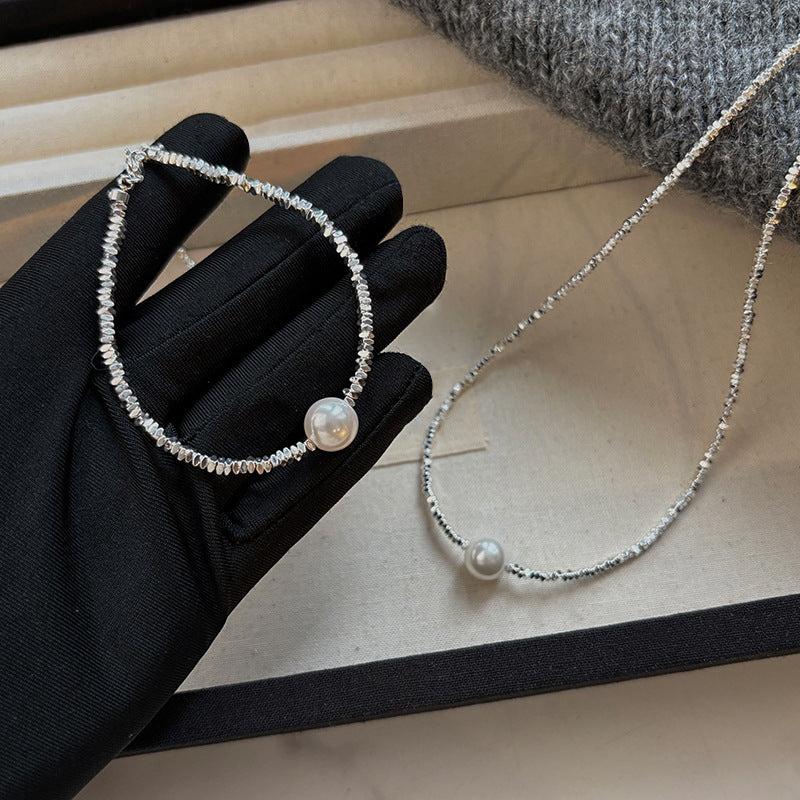Elegant Pearl and Silver Bracelet and Necklace Set with Geometric Design
