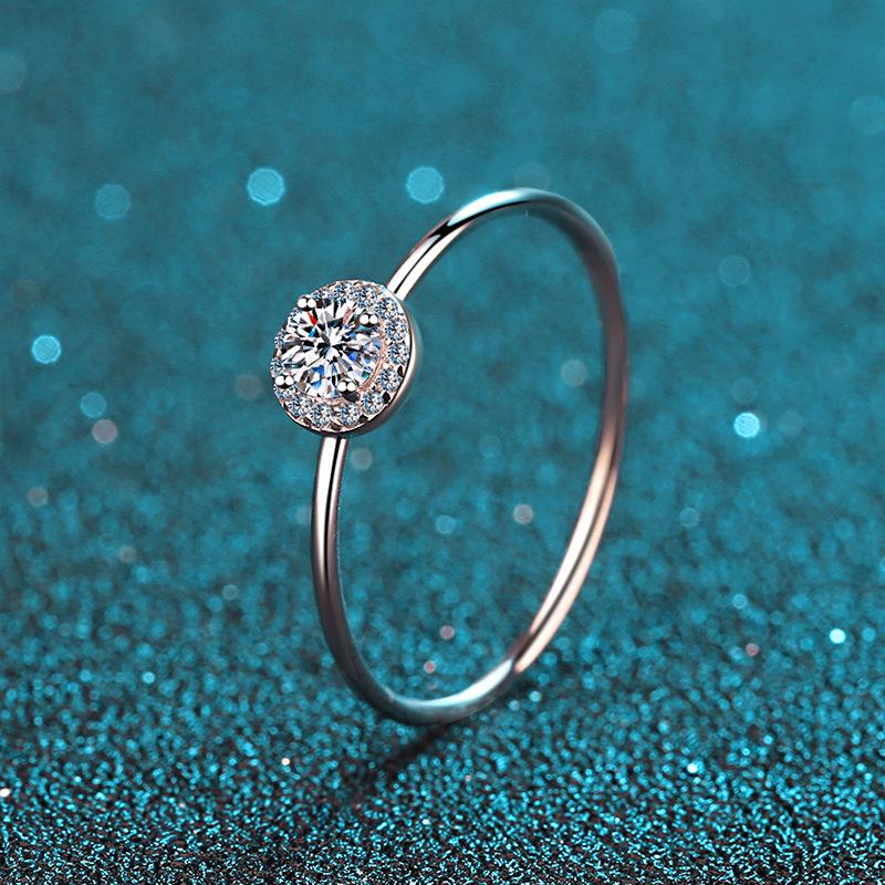Round Moissanite Ring with Camellia Floral Design in Platinum Plated Sterling Silver