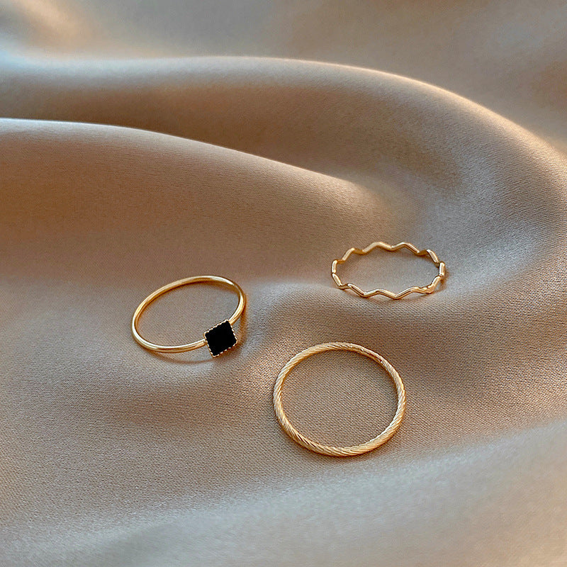 Geometric Black Zirconia Stackable Ring Set in Gold-Tone with Minimalist Design