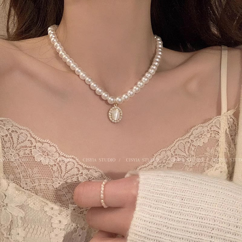 Baroque Pearl Necklace with Cat's Eye Pendant for Women - Elegant Geometric Design Gold-Toned Chain