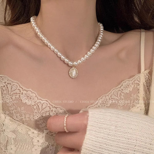 Baroque Pearl Necklace with Cat's Eye Pendant for Women - Elegant Geometric Design Gold-Toned Chain