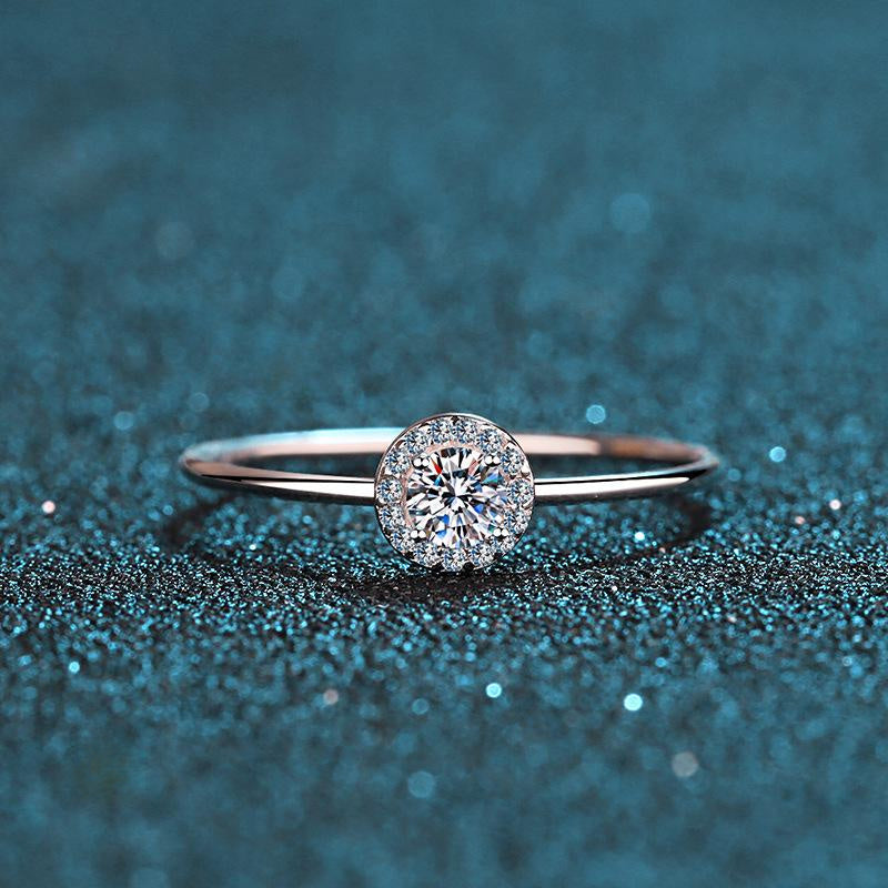 Round Moissanite Ring with Camellia Floral Design in Platinum Plated Sterling Silver