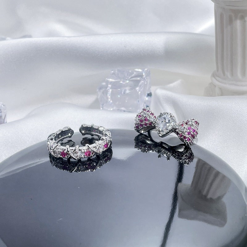 Sweet & Edgy Bow Ring with Red Zircon Accents - Adjustable Open Ring for Women