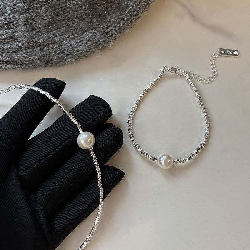Elegant Pearl and Silver Bracelet and Necklace Set with Geometric Design