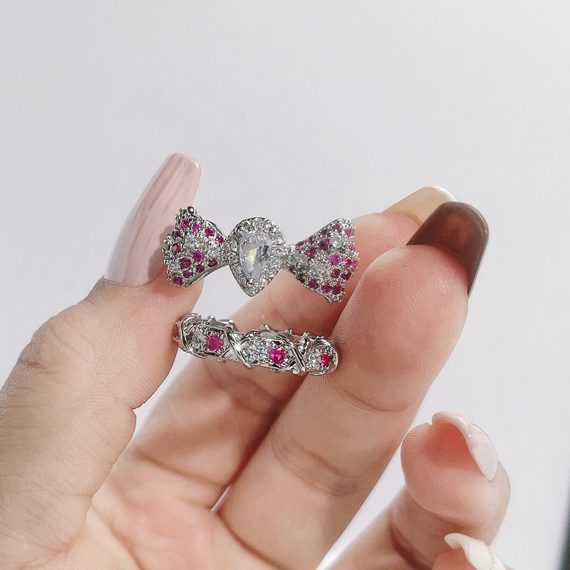 Sweet & Edgy Bow Ring with Red Zircon Accents - Adjustable Open Ring for Women