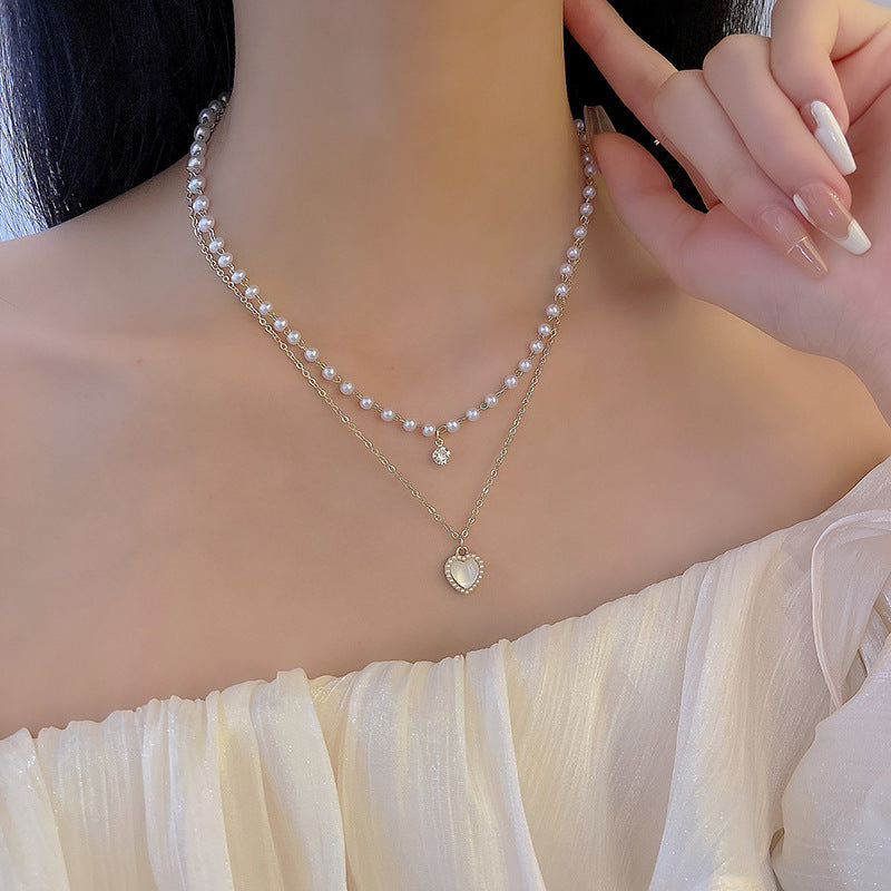 Layered Pearl and Mother-of-Pearl Pendant Necklace with Heart Design in X900 Gold Tone
