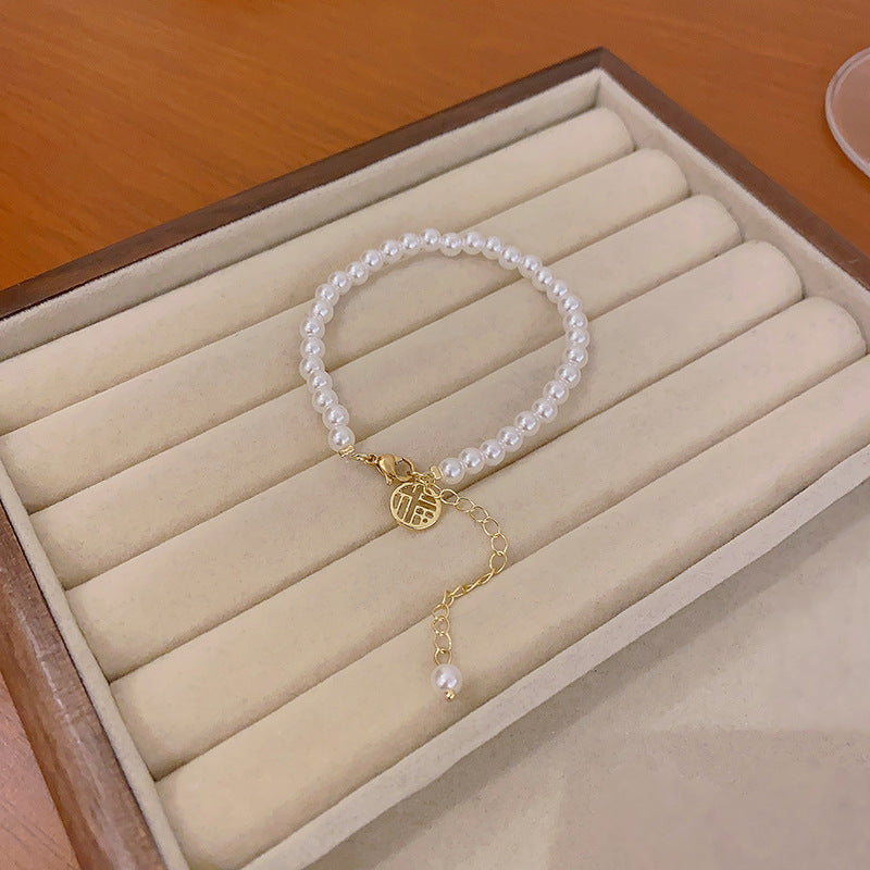 Lucky Charm Pearl Beaded Bracelet for Women with Geometric Design
