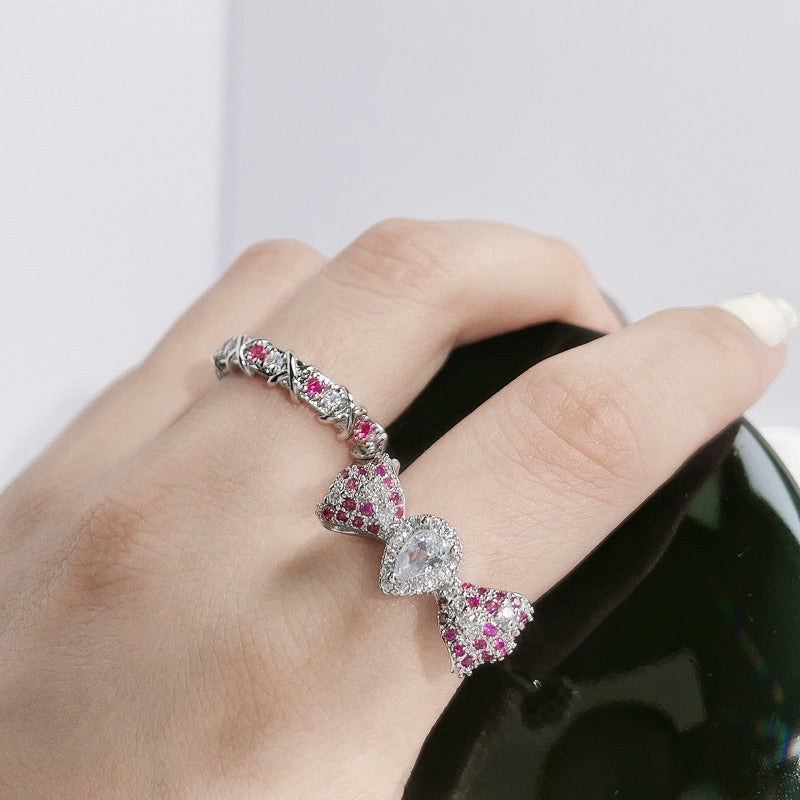 Sweet & Edgy Bow Ring with Red Zircon Accents - Adjustable Open Ring for Women