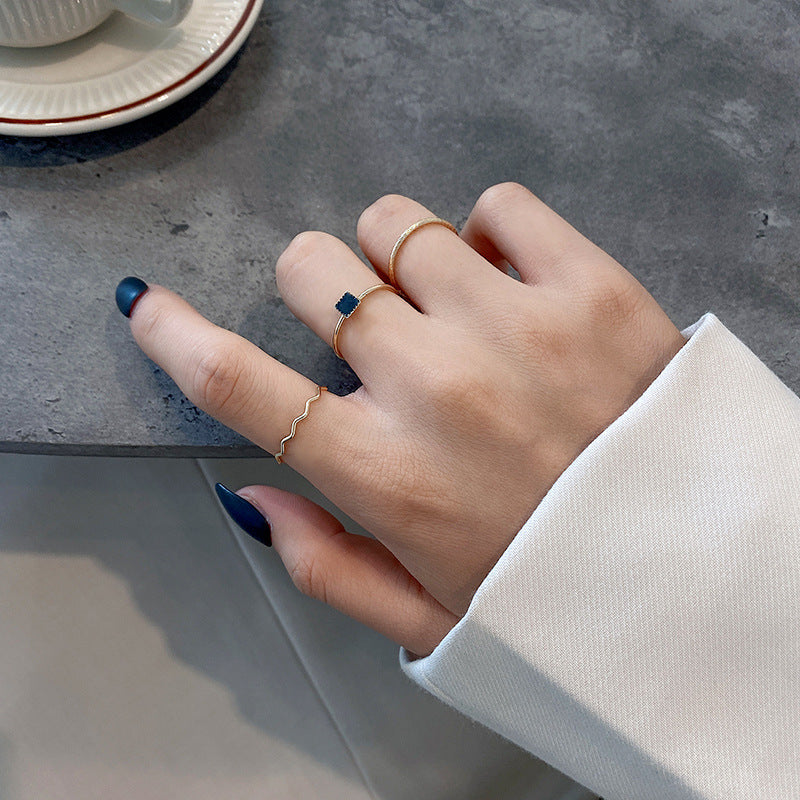 Geometric Black Zirconia Stackable Ring Set in Gold-Tone with Minimalist Design