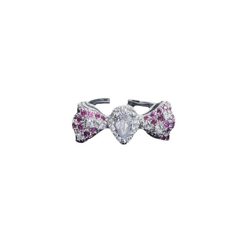 Sweet & Edgy Bow Ring with Red Zircon Accents - Adjustable Open Ring for Women