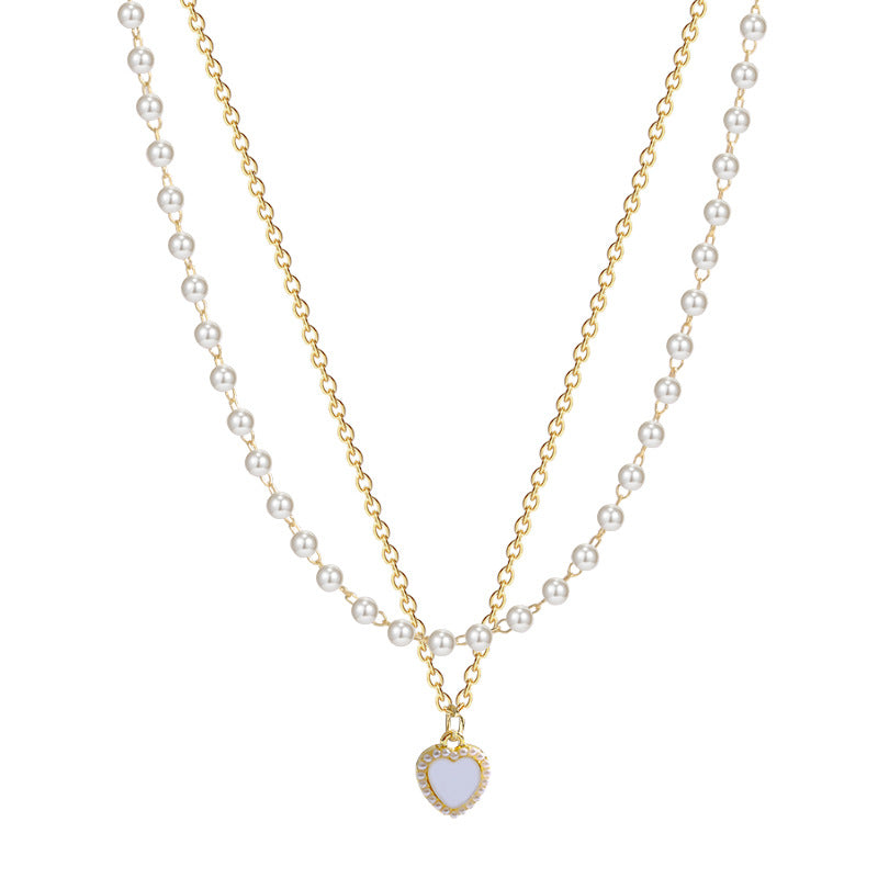 Layered Pearl and Mother-of-Pearl Pendant Necklace with Heart Design in X900 Gold Tone