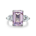 925 sterling silver  featuring a rectangular center stone flanked by teardrop shaped side stones, for a total of three stones  Ring