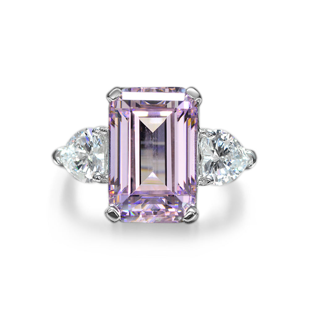 925 sterling silver  featuring a rectangular center stone flanked by teardrop shaped side stones, for a total of three stones  Ring