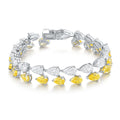 Pear-Cut Two-Tone Moissanite Leaf Tennis Bracelet in 925 Sterling Silver