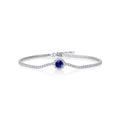 Round-Cut Lab-Created Blue Sapphire Halo Tennis Bracelet in 925 Sterling Silver