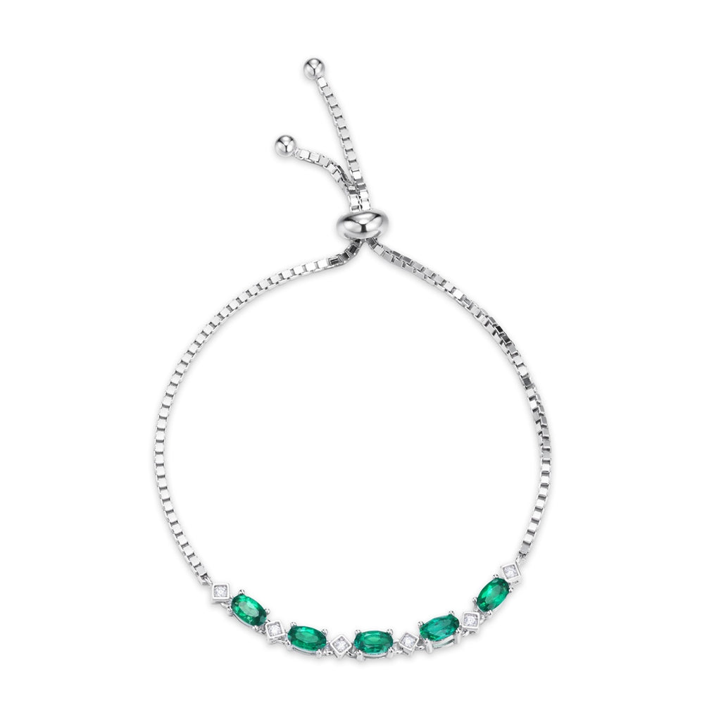 Oval-Cut Lab Emerald Bolo Tennis Bracelet in 925 Sterling Silver