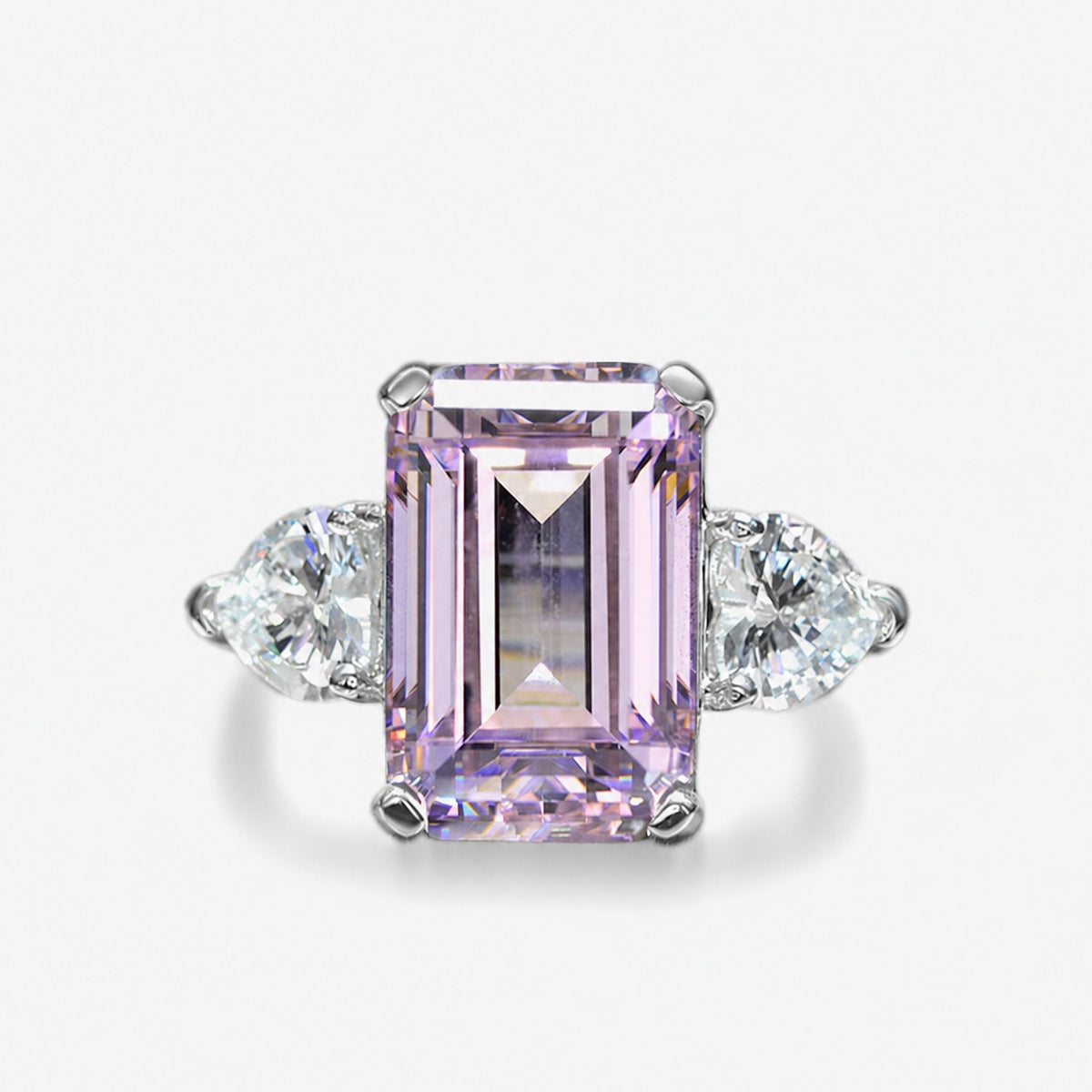 925 sterling silver  featuring a rectangular center stone flanked by teardrop shaped side stones, for a total of three stones  Ring