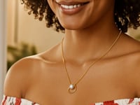 Pendentif cœur ouvert et collier de perles en or jaune 14 carats
